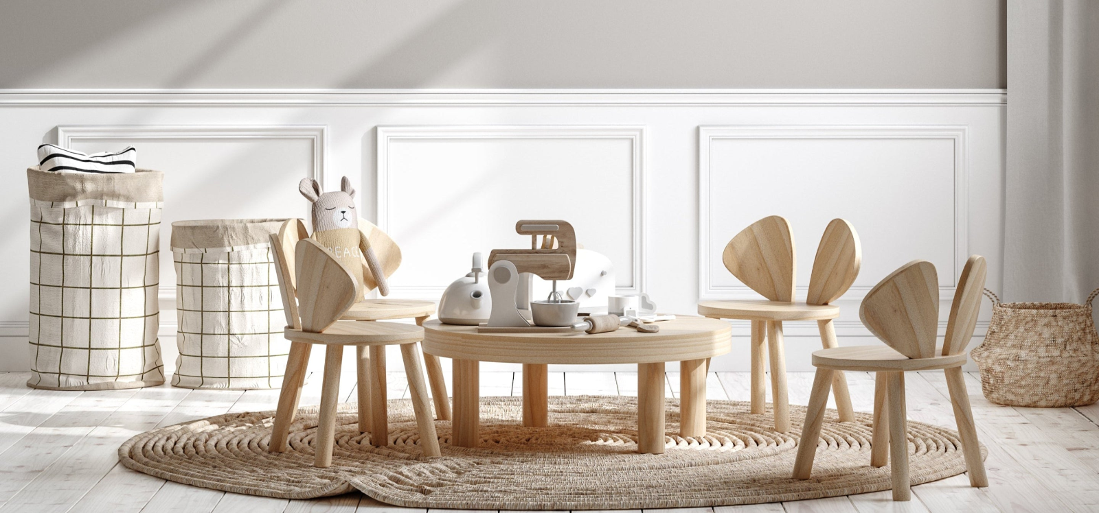 Image of a minimalistic boho-chic childrens room with a wooden table and chairs